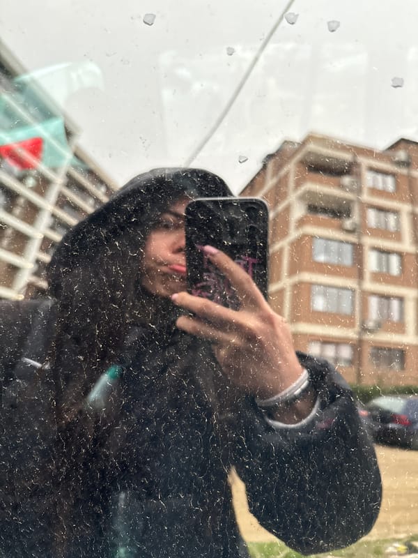 Early morning phone photography captured in Sofia window reflection