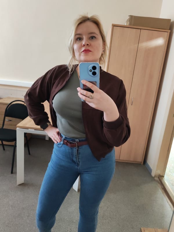 Spring snow and office worker captured in Izhevsk