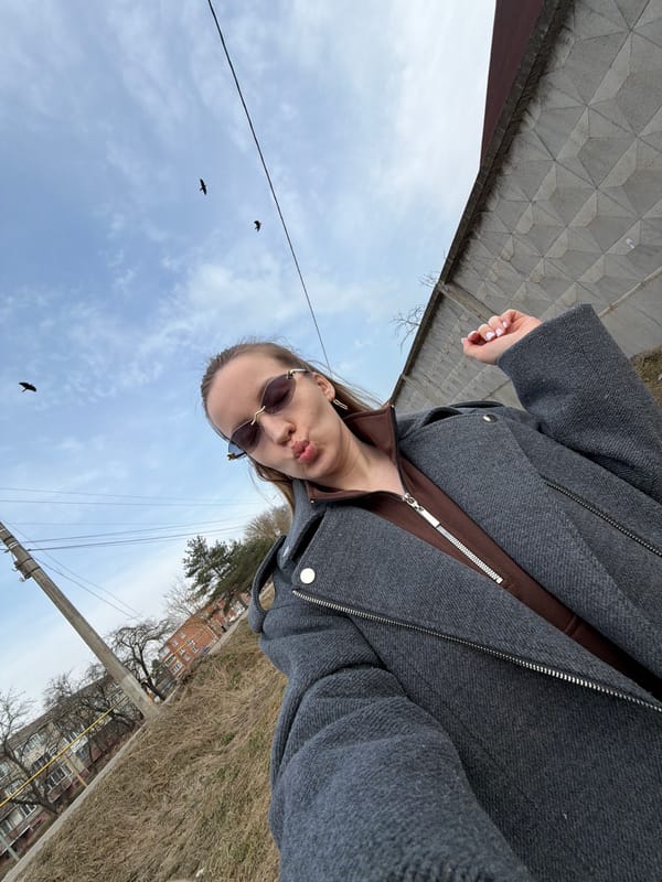 Woman takes morning selfies with baby in Reshetnikovo