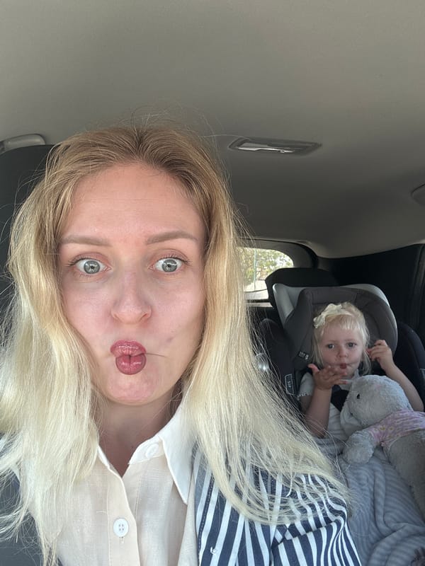 Woman takes selfies in car with child, Petah Tikva