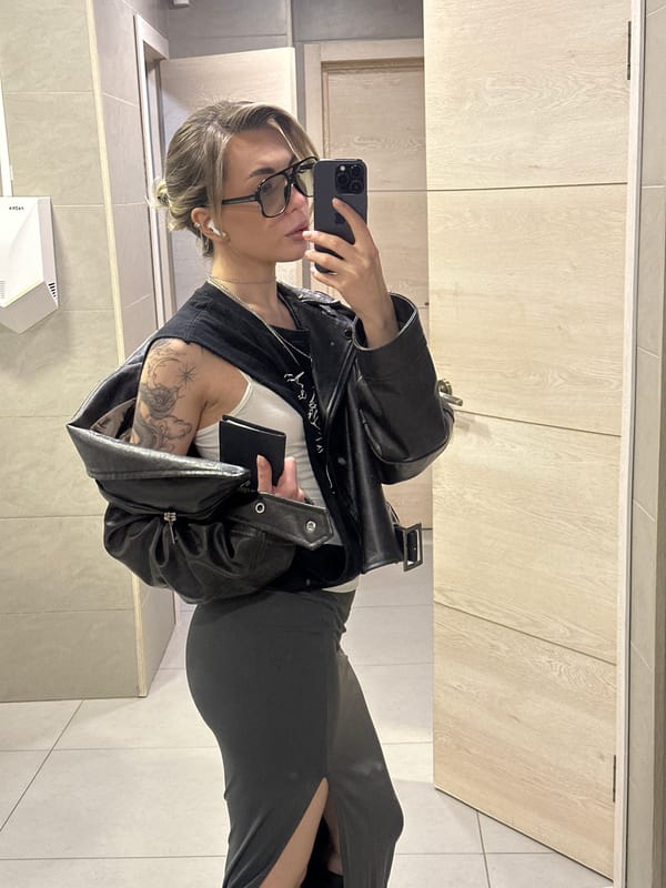 Woman takes bathroom selfie with two phones in Khimki