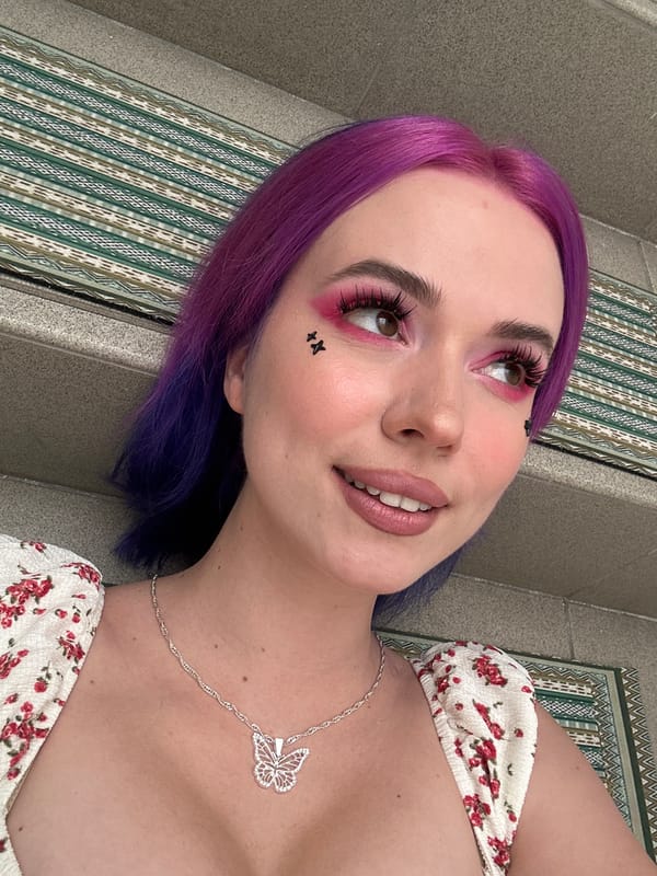 Purple-haired woman photographed in multiple poses in Ljubljana