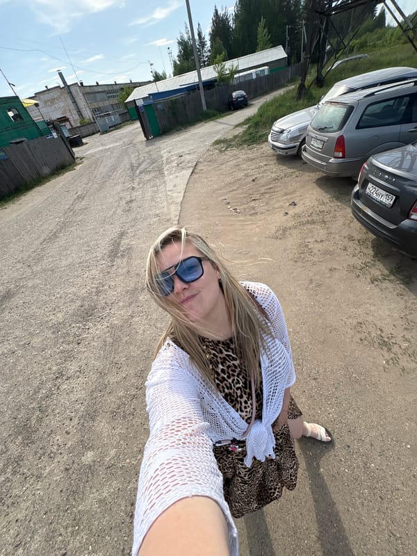 Woman takes selfies near power lines in Noviy, Russia