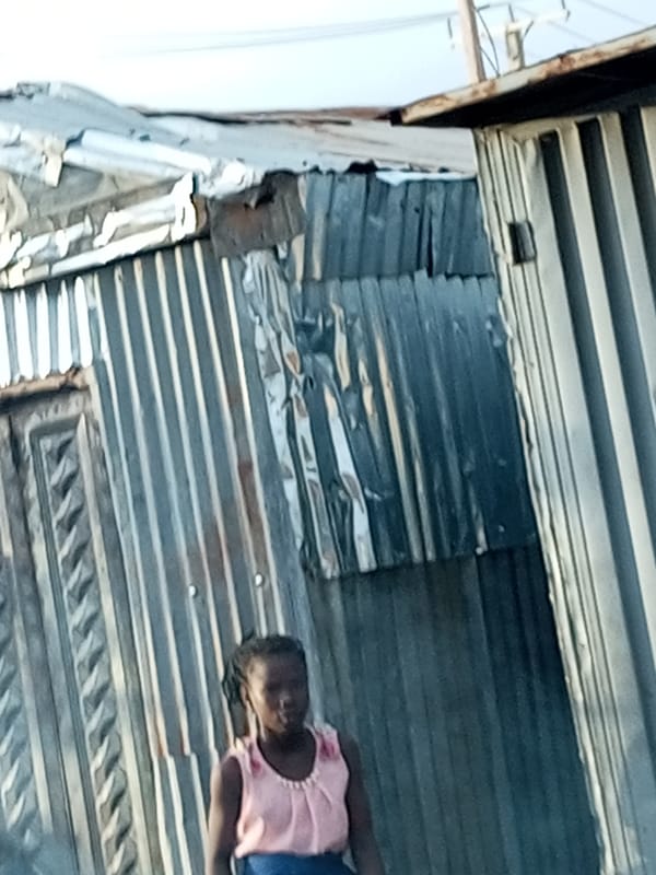 Everyday street life and roadside mechanics in Tempure, Nigeria