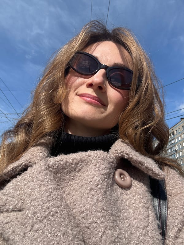 Woman takes selfie on sunny morning in Kryvyi Rih