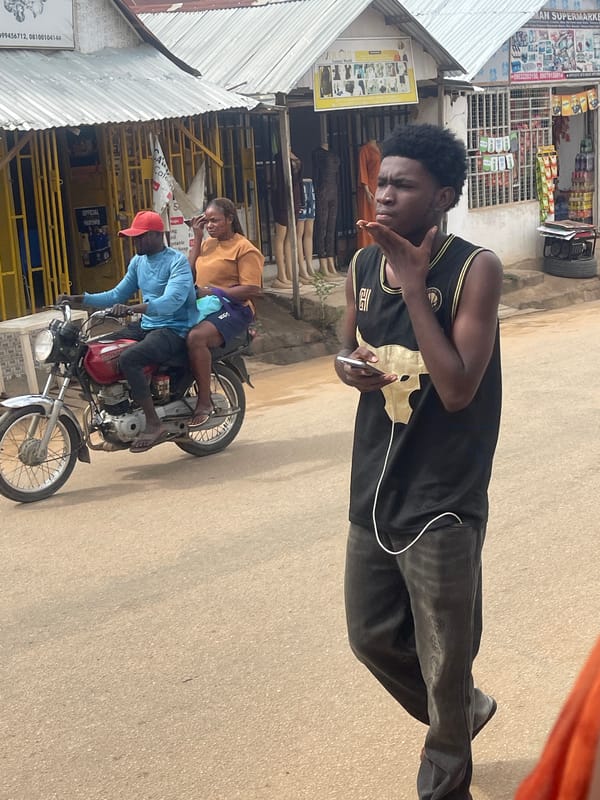 Daily life unfolds across Abuja streets and neighborhoods
