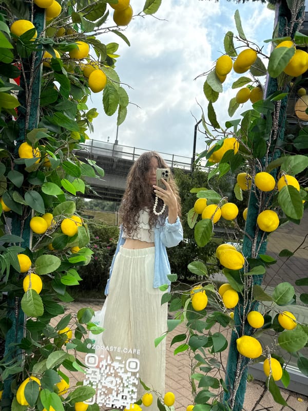 Selfie moment at a decorative lemon tree archway in Khimki