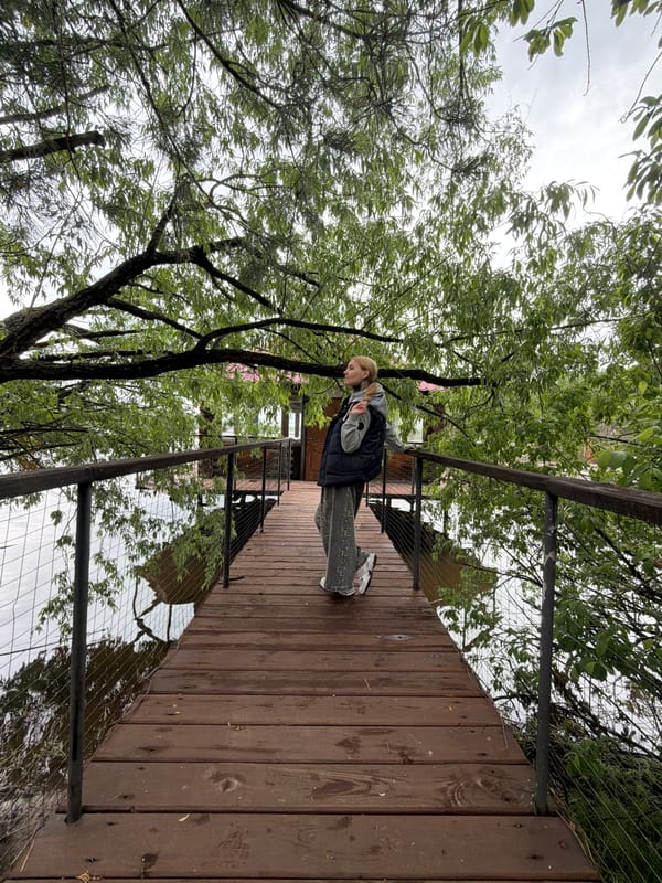 Woman visits lakeside recreational area in Chaykovsky, Russia