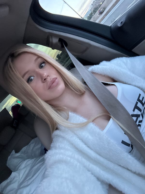 Passenger seat selfie duo, Saint Petersburg car interior