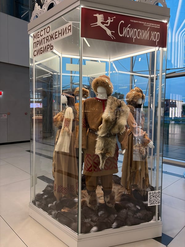 Inside Tolmachevo Airport and a local cultural exhibit, Ob