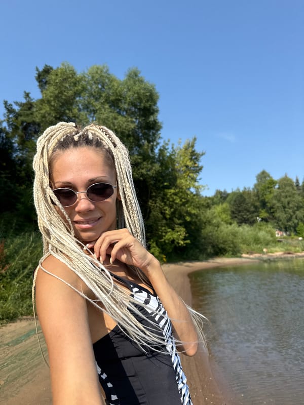 Beach selfies at a sunny Russian waterfront on a summer morning
