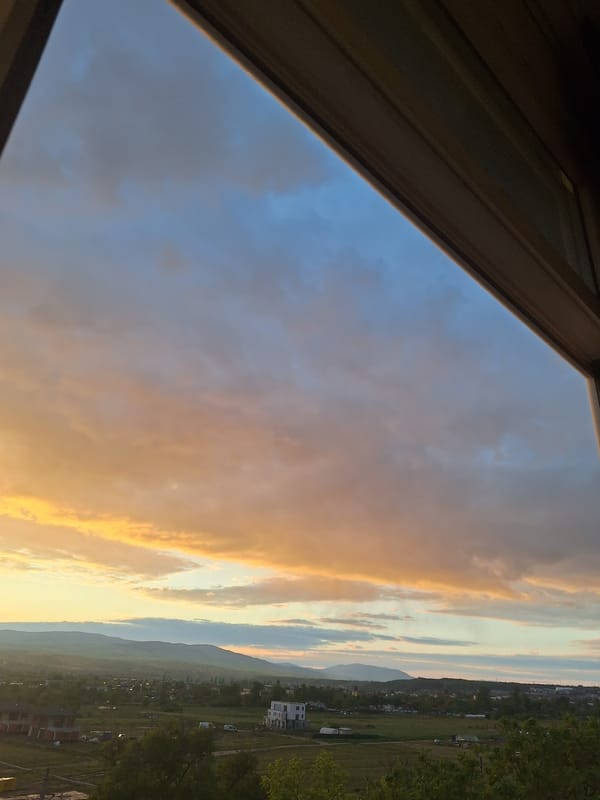 Sunset photographed from building overlooking Blagoevgrad mountains