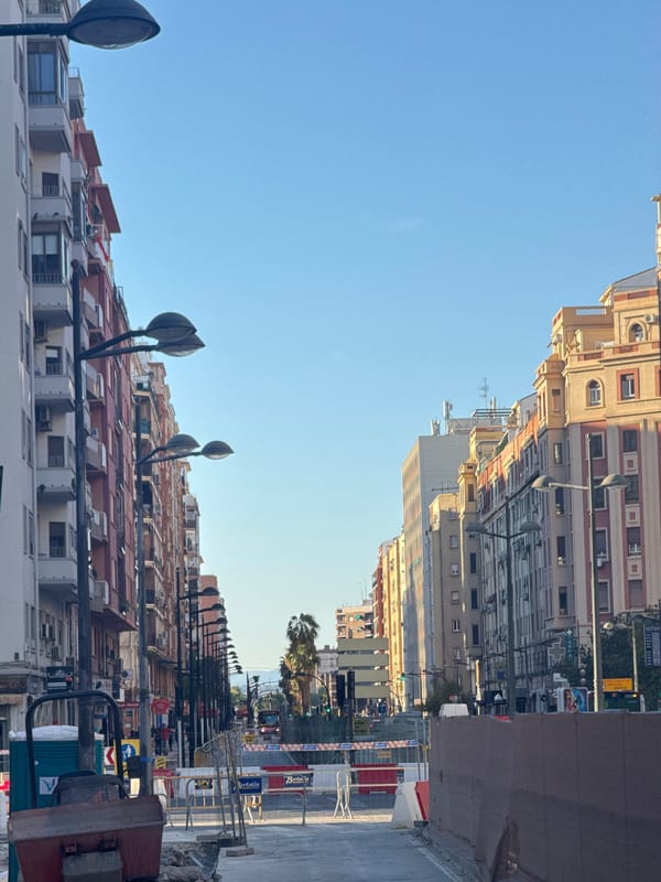 Street view captured in Valencia showing mixed architecture buildings