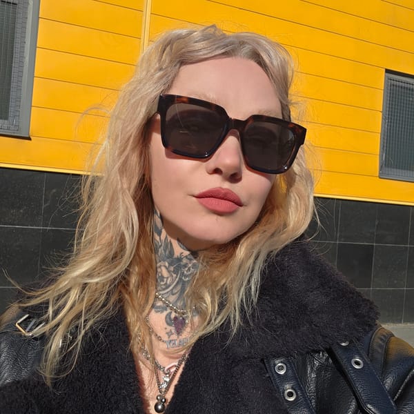 Woman takes selfies in Saint Petersburg pedestrian area