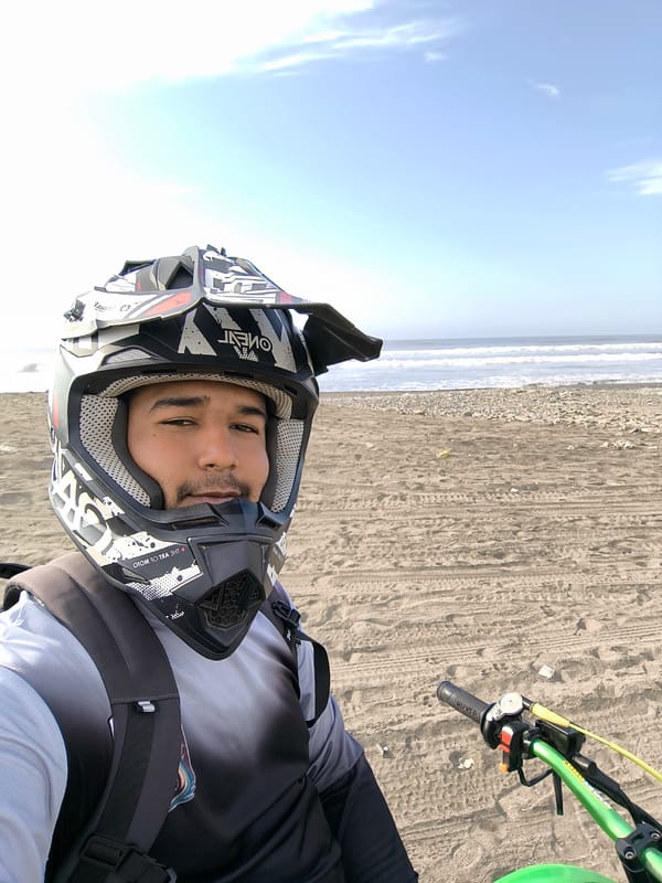 Motorcyclist photographed riding dirt bike on Huanchaco beach