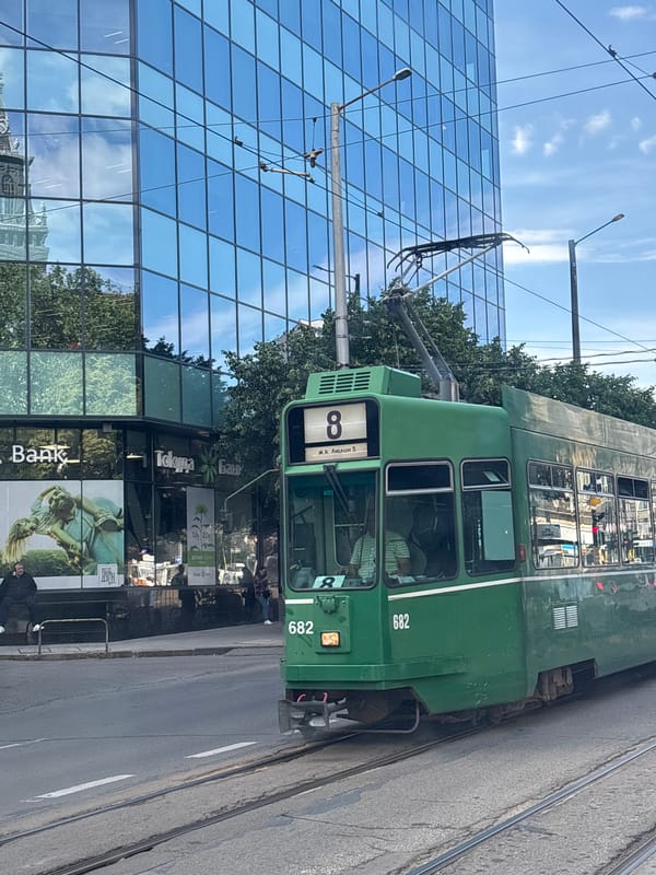 Tram 8 and pedestrians share a Sofia intersection