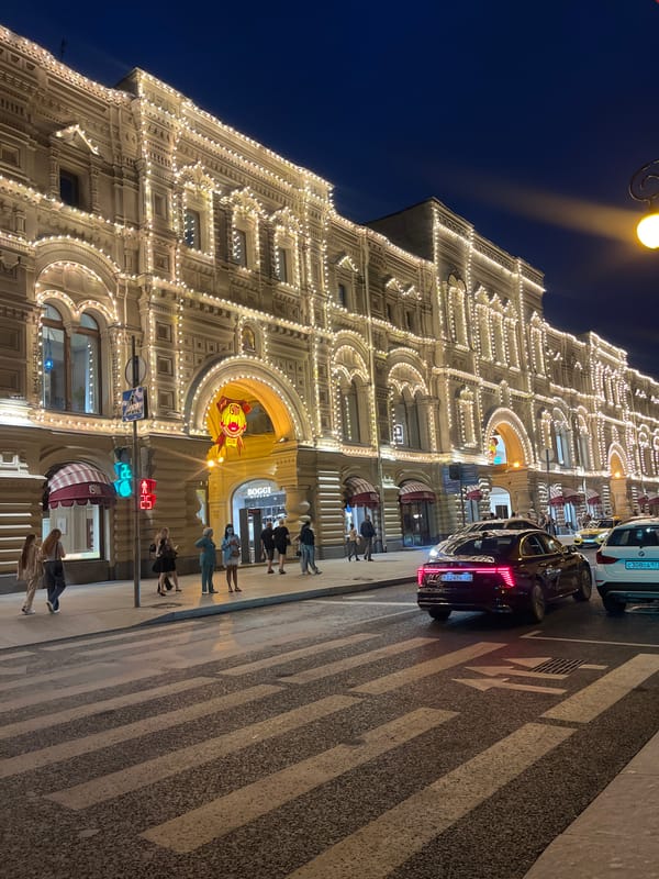 GUM department store lit up at night near Red Square