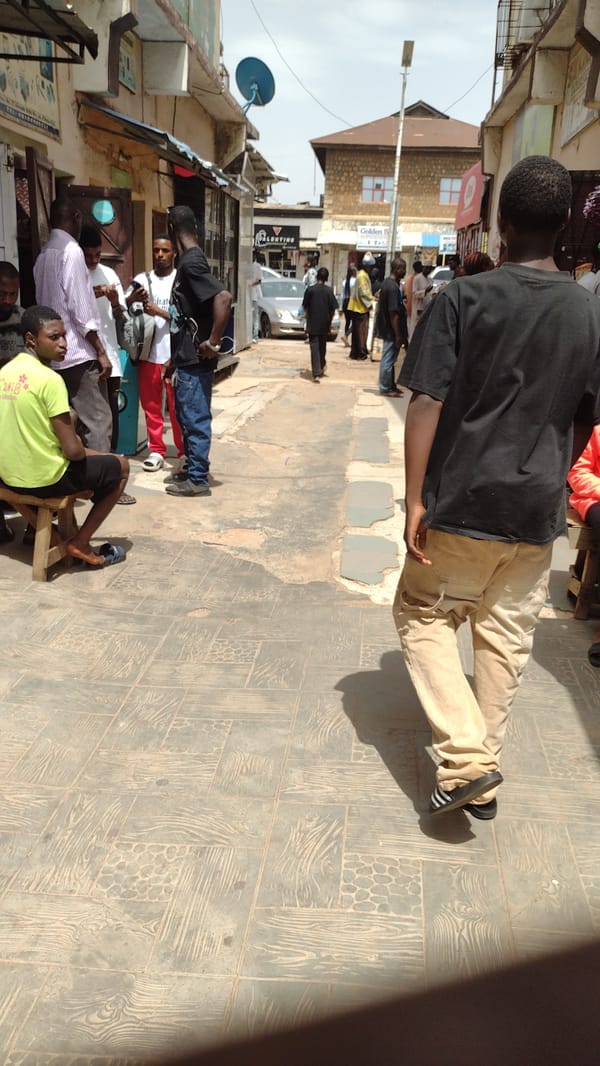 Ordinary street life documented across Jos, Nigeria during midday