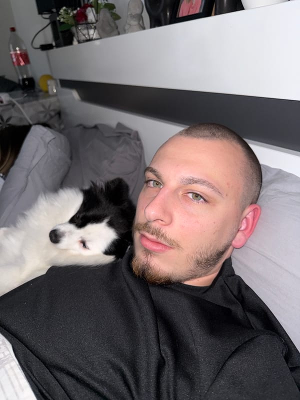 Man and dog share quiet bedtime moment in Bulgaria