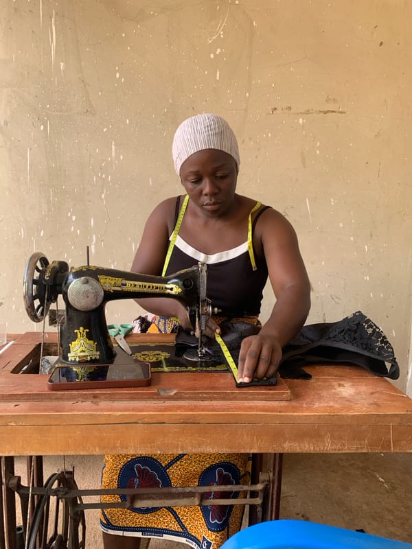 Focused work at a wooden sewing table