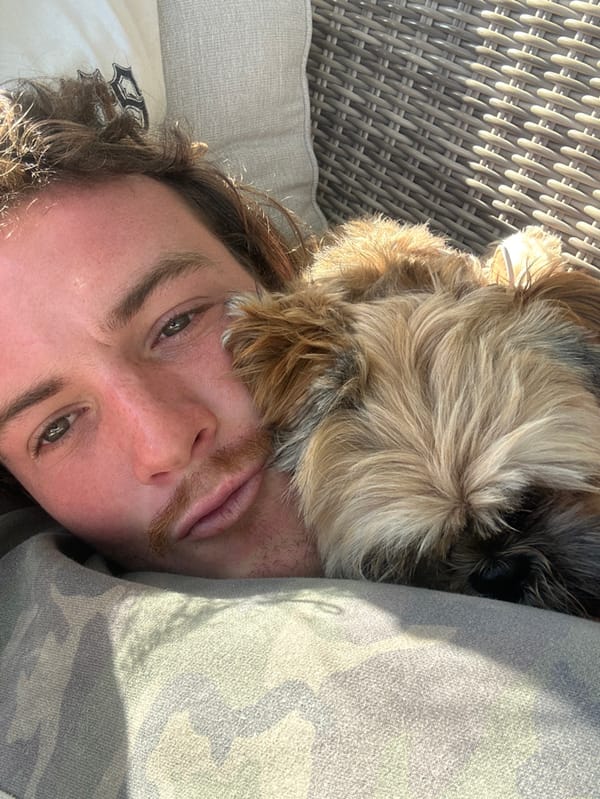 Couple enjoys evening beach activities in coastal Bulli, Australia