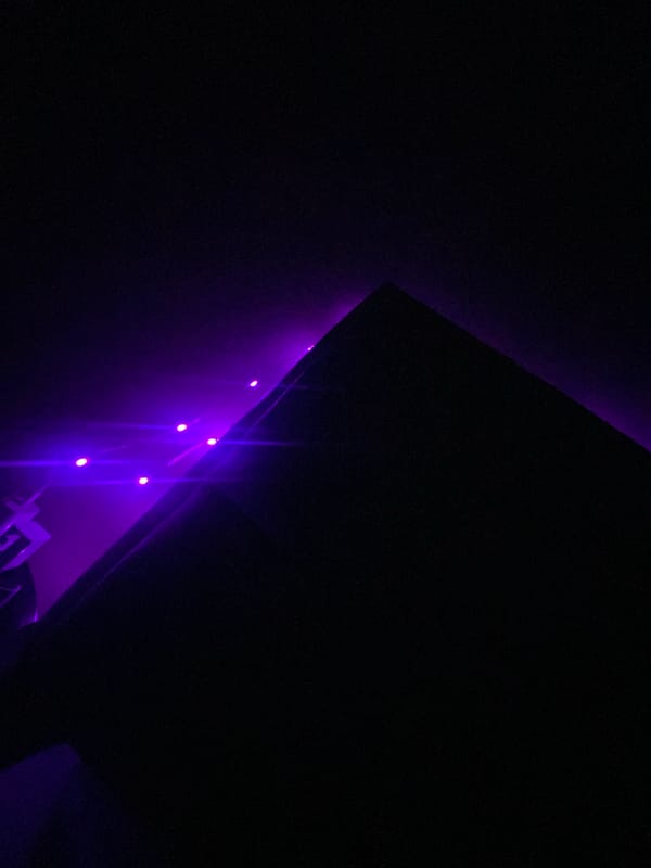 Purple lights illuminate dark interior space in Yekaterinburg