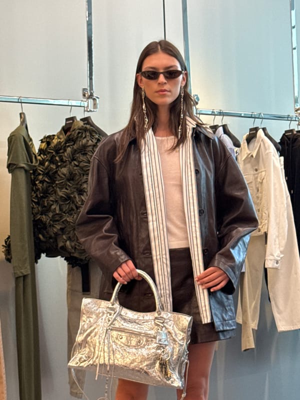 Women browse clothing at Dubai boutique during morning shopping