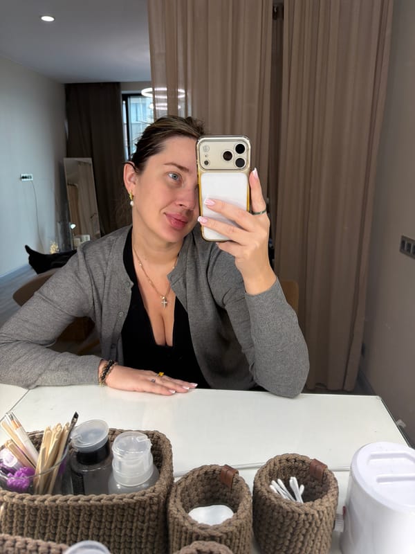 Woman takes mirror selfie with iPhone in Khimki