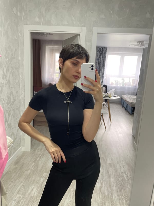 Woman takes morning selfies in Izhevsk home