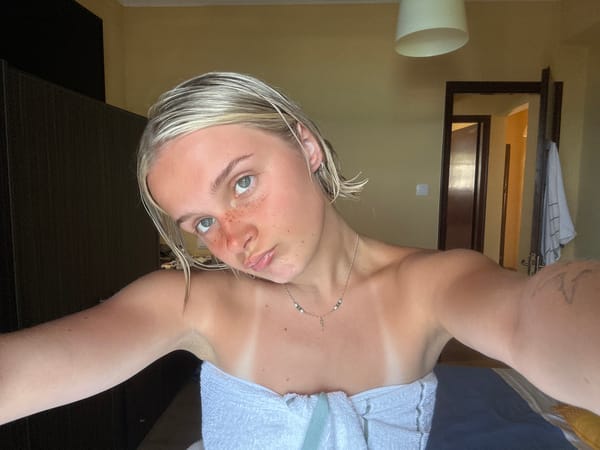 Lazy beach morning in coastal Greece, selfies and sun