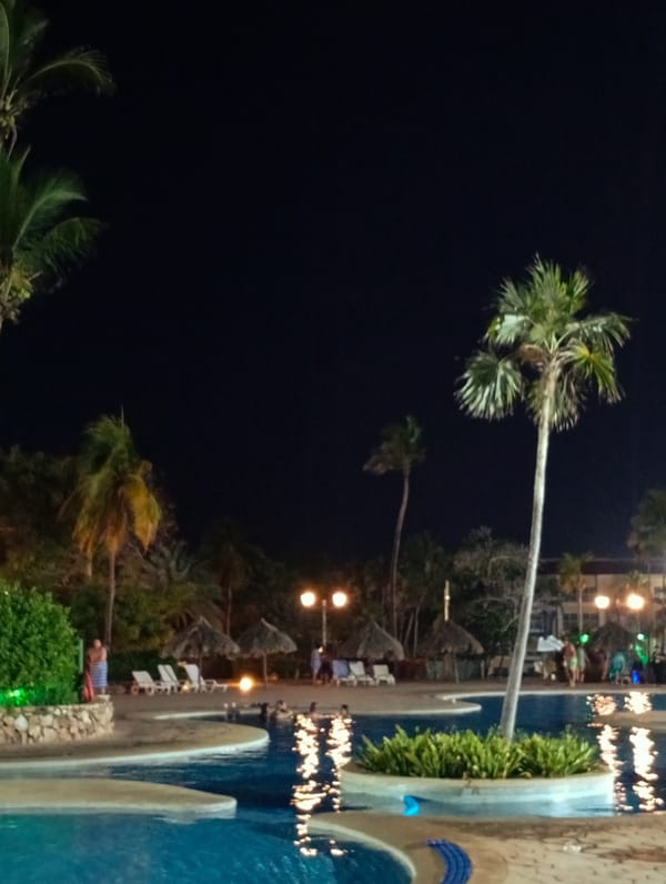 Resort guests enjoy evening pool activities in Venezuela