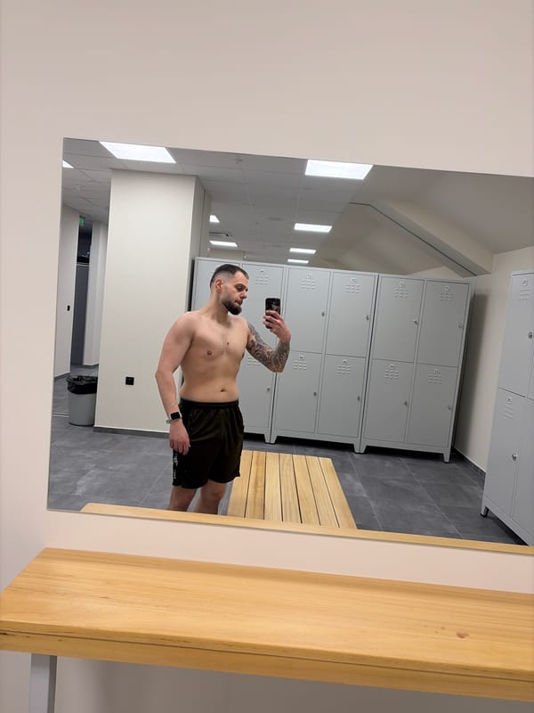 Man takes shirtless selfie in Plovdiv gym locker room