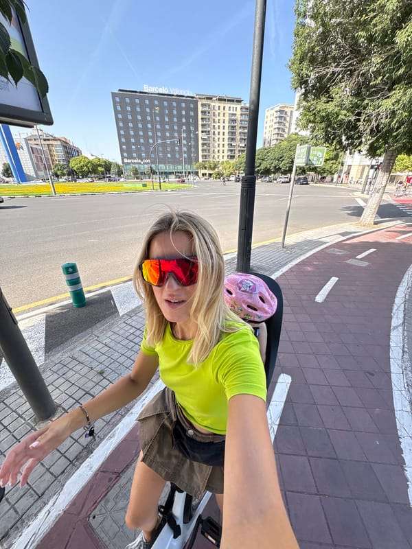 Cyclists pause for a selfie moment in Valencia