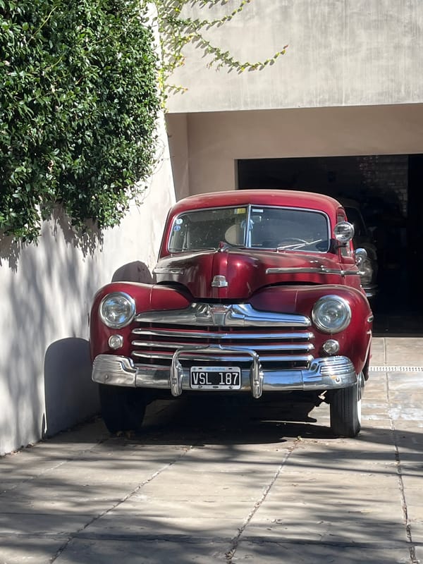 Vintage vehicles spotted in Buenos Aires suburbs during sunny afternoon