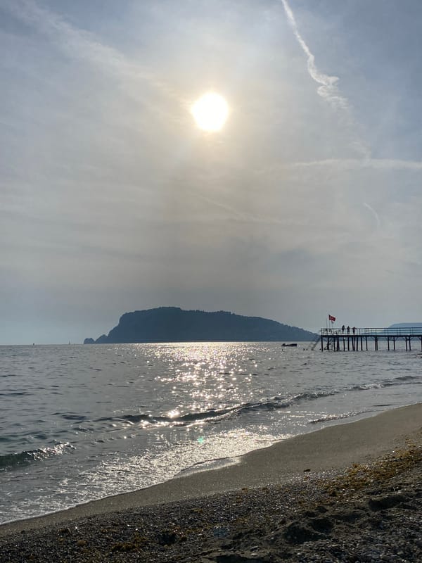 Afternoon beach life and construction activity in Alanya, Turkey