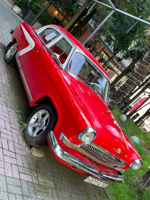 Classic Soviet car and selfies on a Sochi promenade