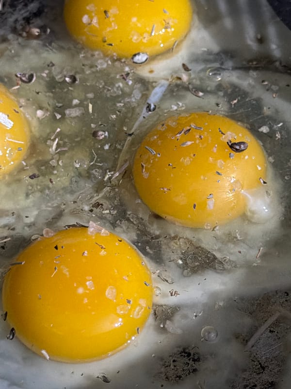 Raw eggs prepared for cooking observed in Tbilisi kitchen