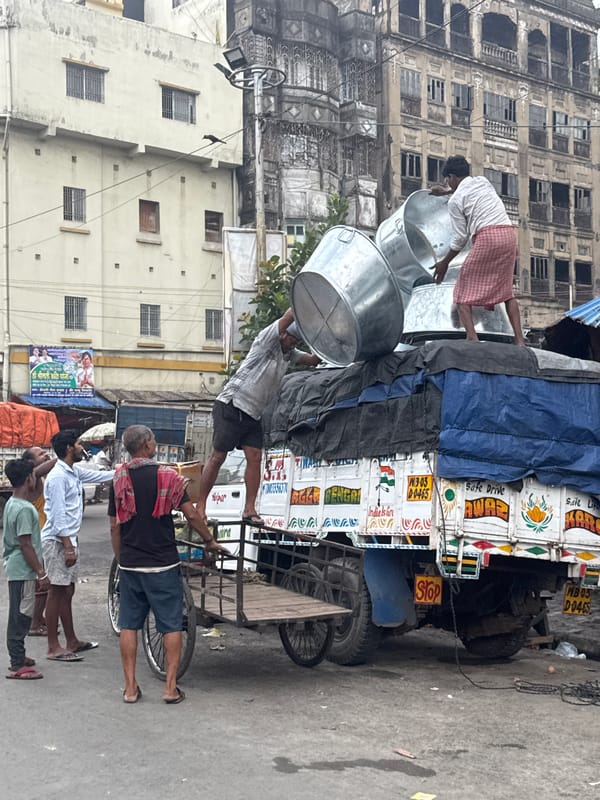 Street vendors conduct daily commerce across Kolkata