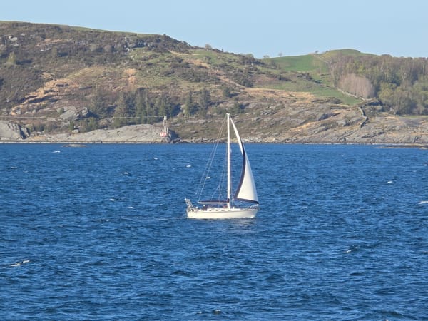 Recreational boats sail Norwegian waters near Randaberg coastline