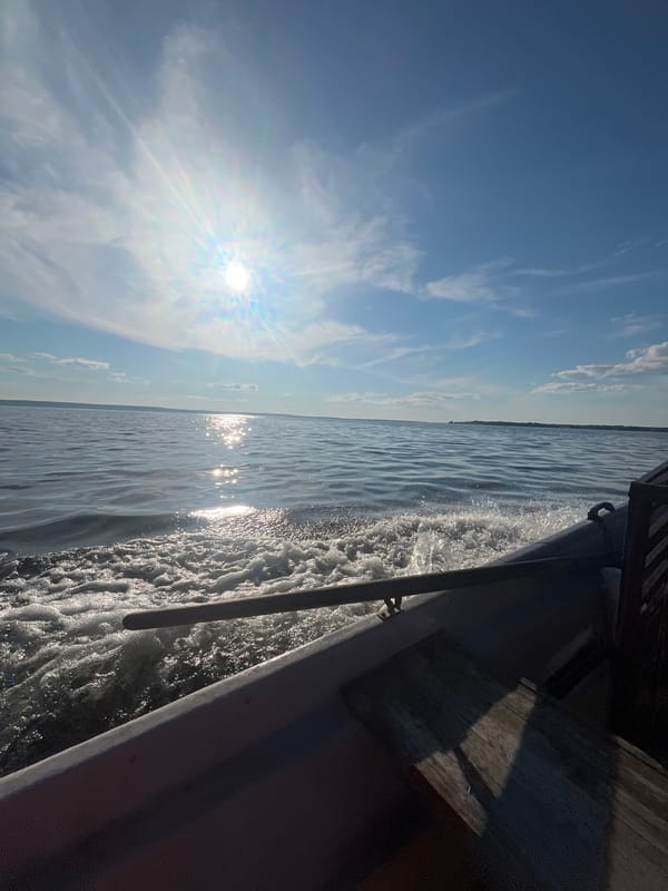 Afternoon boat ride across open water near Siukterka, Russia