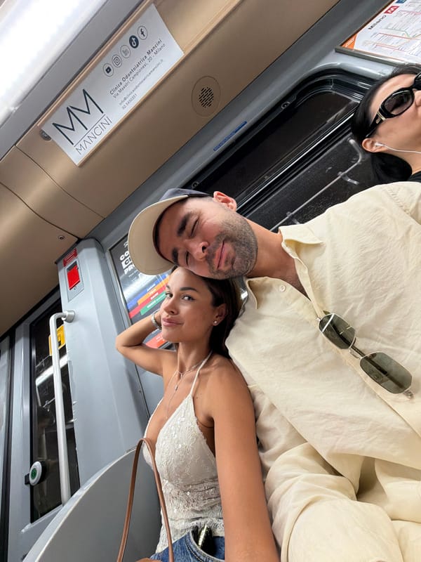 Casual Milan moments: transit selfies and a sculpture poster
