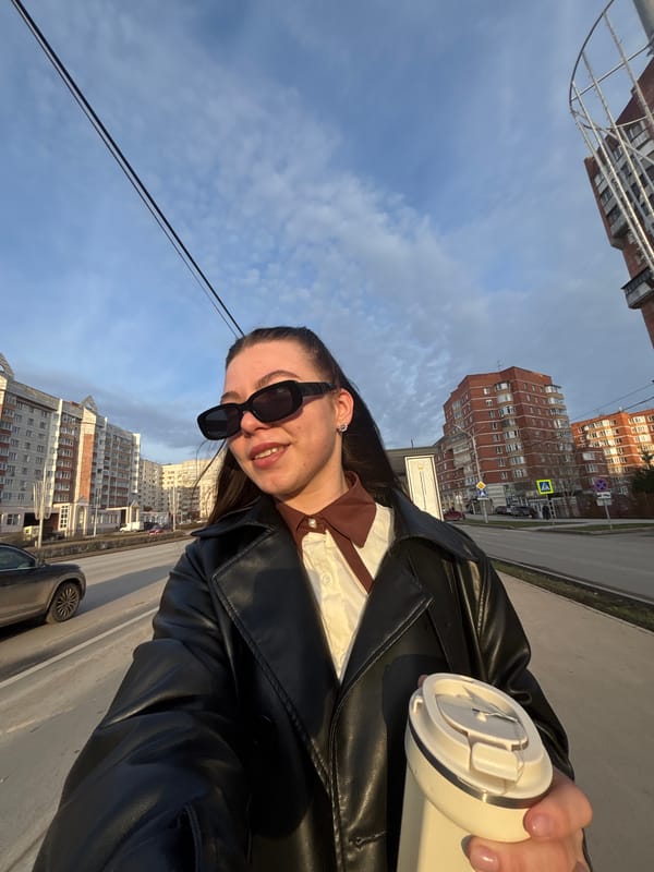 Woman photographed with coffee cup in Perm, Russia
