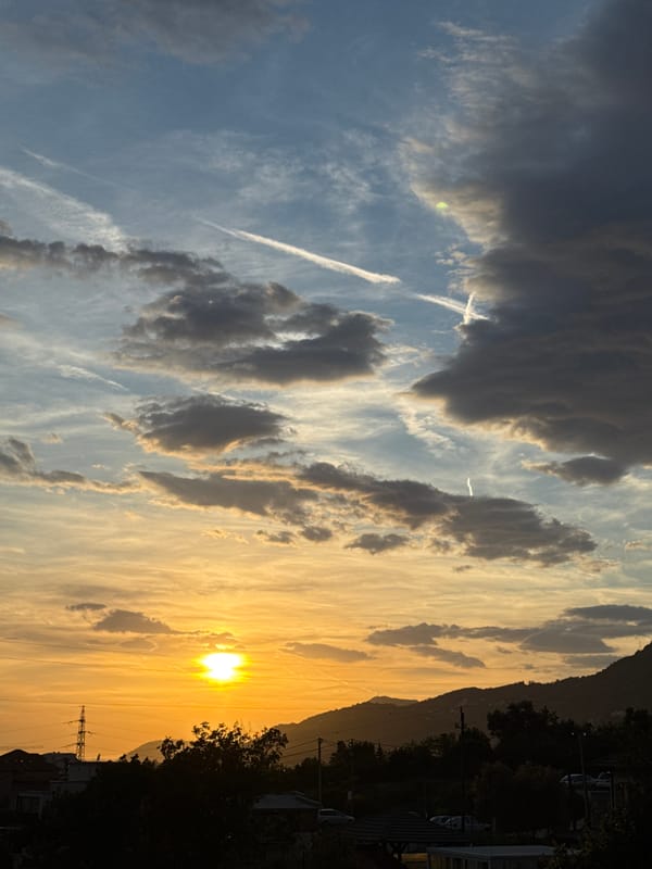 Sunset documented with aircraft contrails over Sustaš, Montenegro