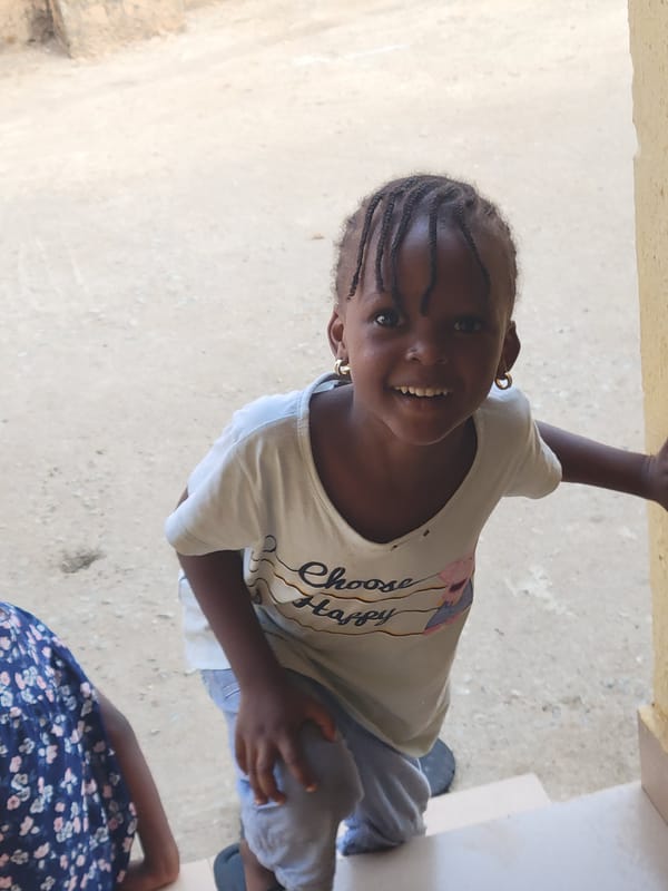 Children gather for playtime in Suleja courtyard