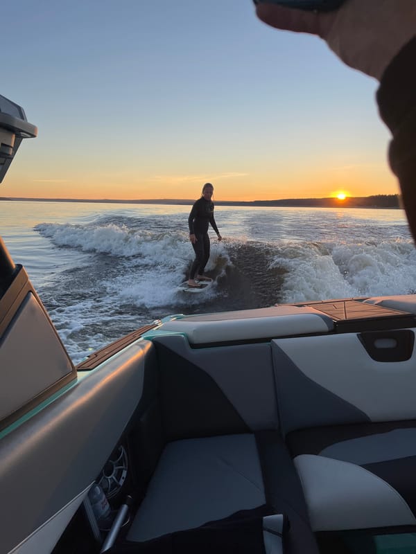 Sunset wakeboarding on a lake outside Gromovo, Russia