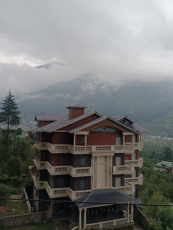 Foggy hill towns in Himachal Pradesh on a grey August morning