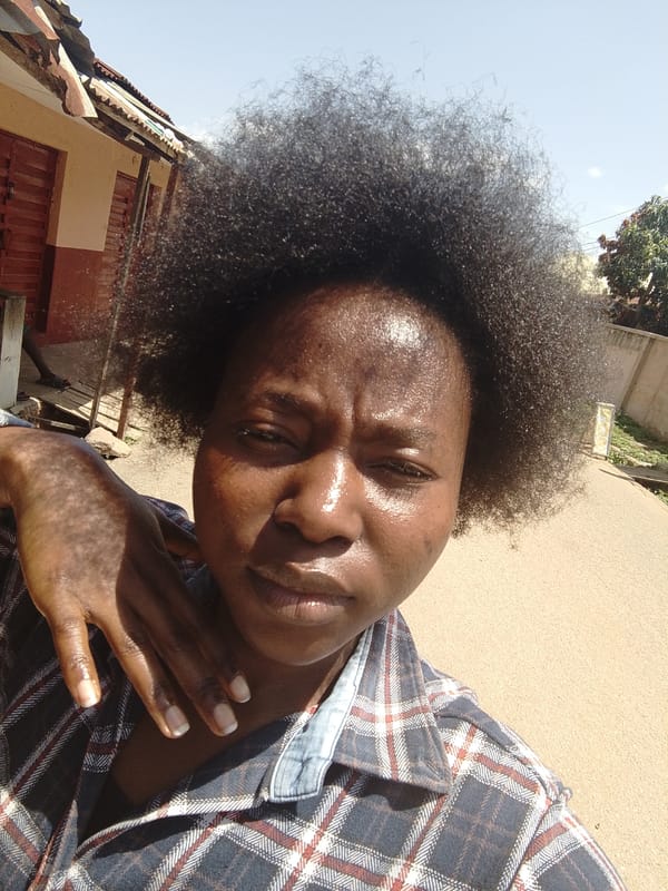 Woman documents afternoon with selfies and beer in Jos, Nigeria