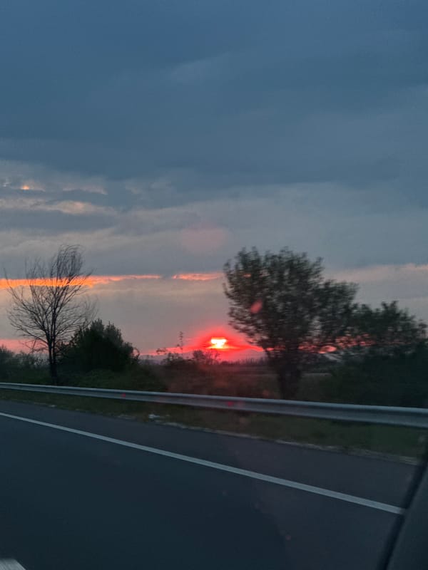 Vibrant sunset observed from roadside in Malo Konare, Bulgaria