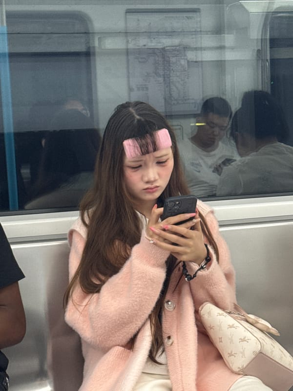 Woman takes selfie on subway train in Tiaodeng