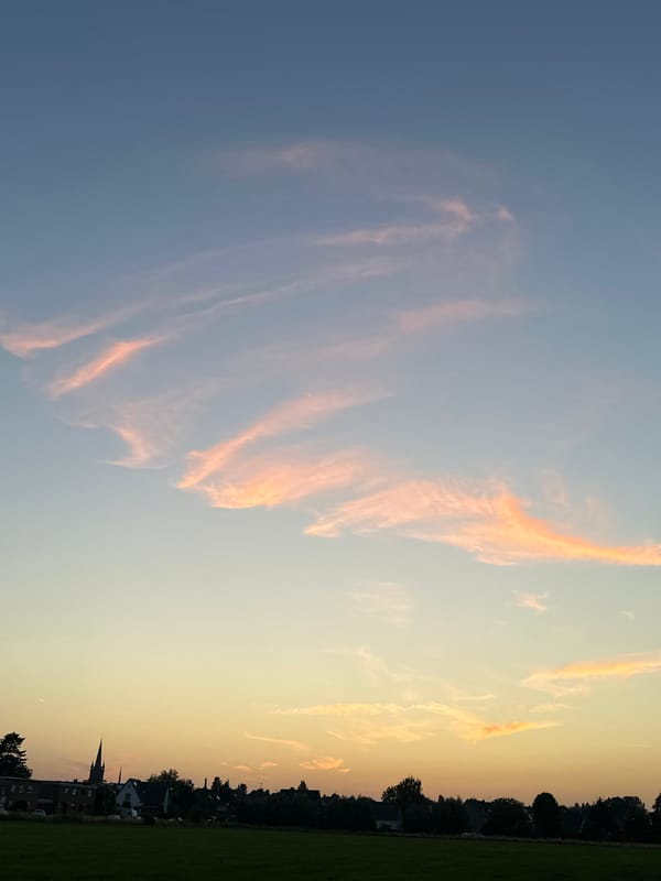 Sunset and moonrise at the rural edge of Krefeld